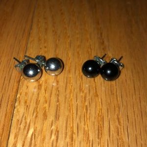 Silver and black stud earrings